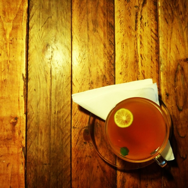 Photo directly above shot of coffee on wooden table