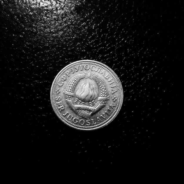 Photo directly above shot of coin on table