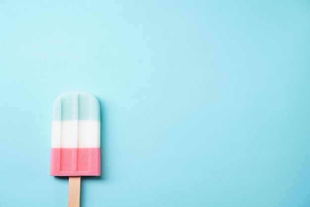 Directly above shot of colored pencils against blue background