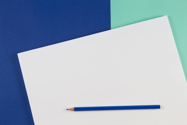 directly above shot of colored pencils on paper