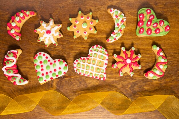 Photo directly above shot of colorful christmas cookies on table