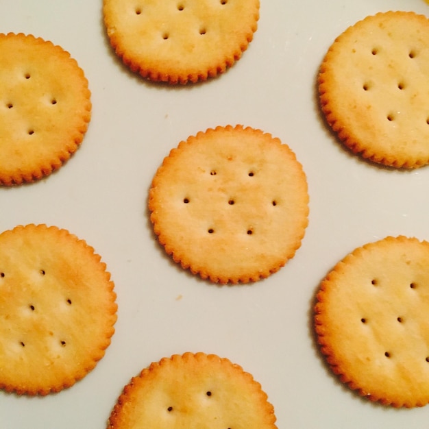 Directly above shot of cookies over white background