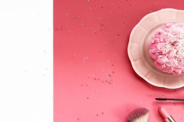 Photo directly above shot of cupcake with beauty products on table