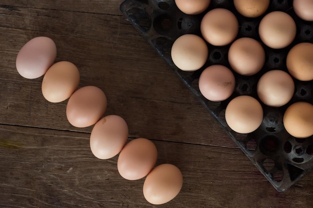 directly above shot of eggs with crate on table