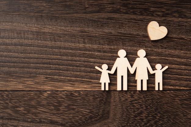 Photo directly above shot of family figurine on table