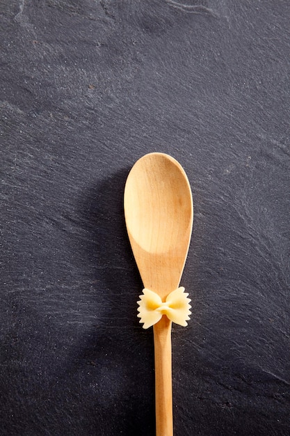 Photo directly above shot of farfalle pasta on spoon