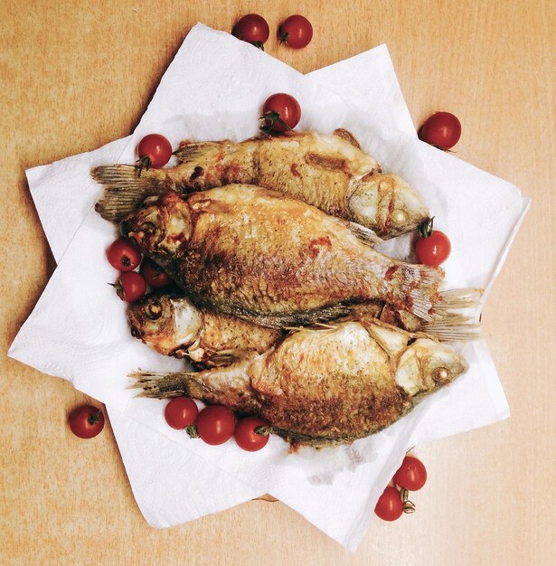 Photo directly above shot of fish served on table