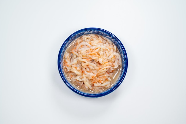directly above shot of food in bowl against white background