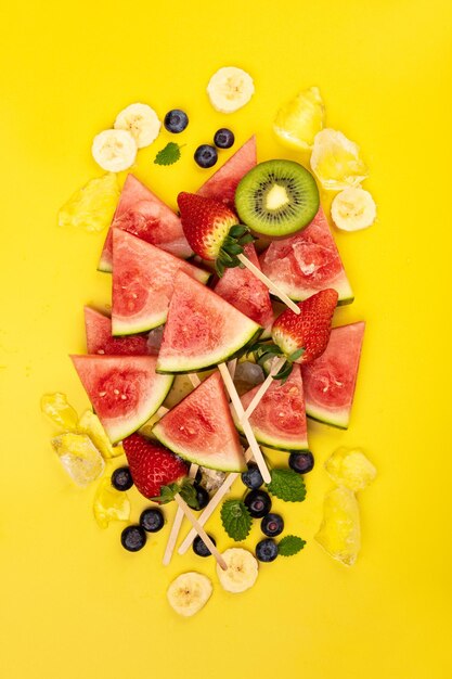 Directly above shot of food on yellow background