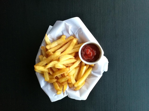 Directly above shot of french fries on table