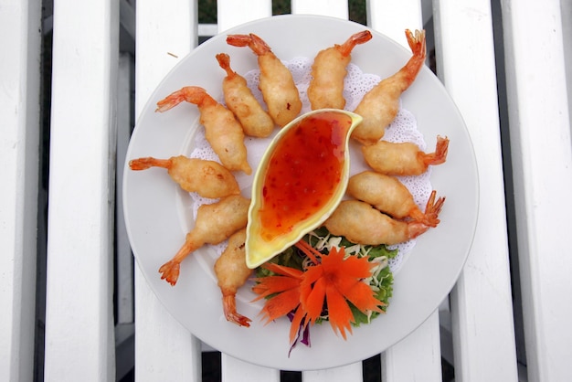 Photo directly above shot of fried shrimps served in plate on table