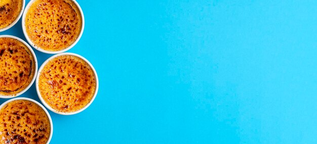 Directly above shot of fruit on table against blue background