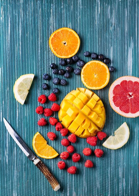 Directly above shot of fruits on blue table