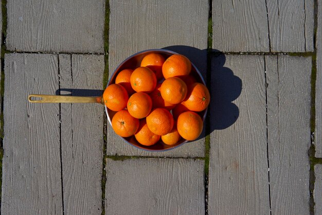 Photo directly above shot of fruits in frying pan on table