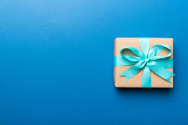 Directly above shot of gift box on blue background