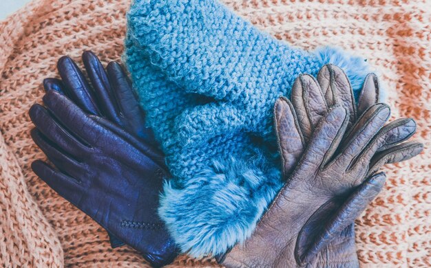 Photo directly above shot of gloves on sweater