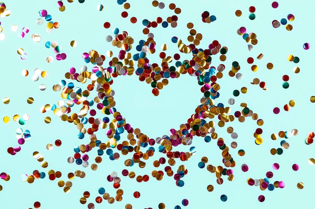 Directly above shot of heart shape made with confetti