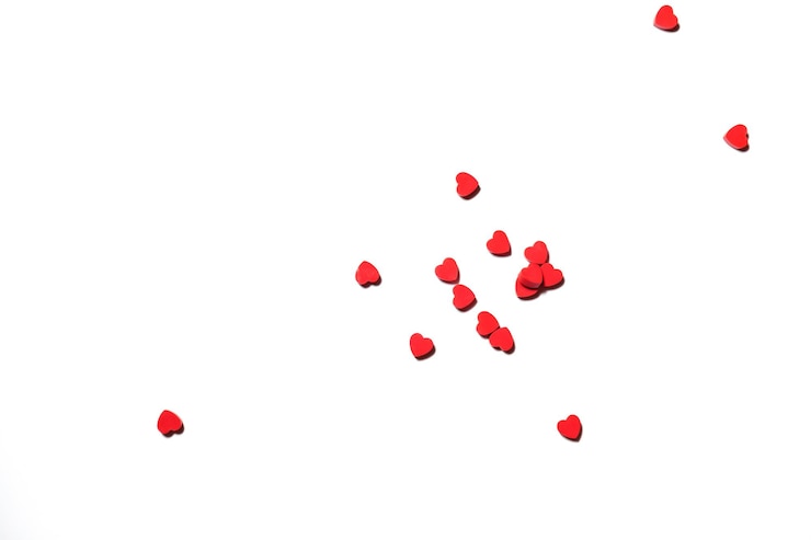Photo directly above shot heart shape over white background