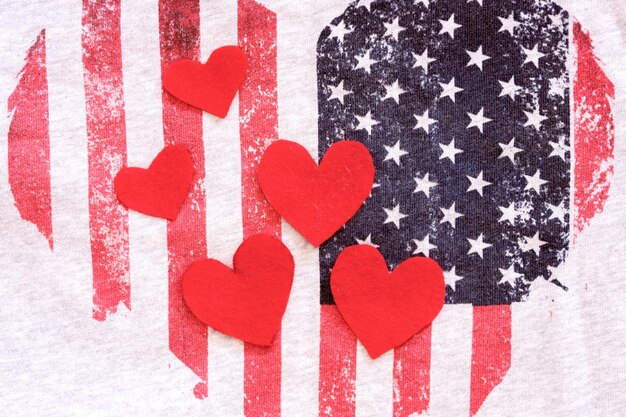 Photo directly above shot of heart shapes on american flag