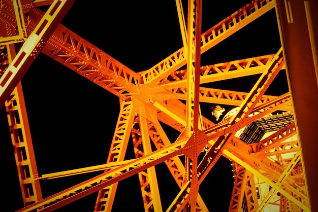 Photo directly below shot of illuminated tokyo tower against sky at night