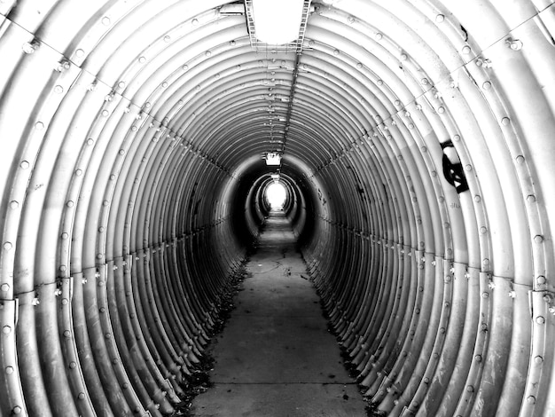 Photo directly below shot of illuminated tunnel