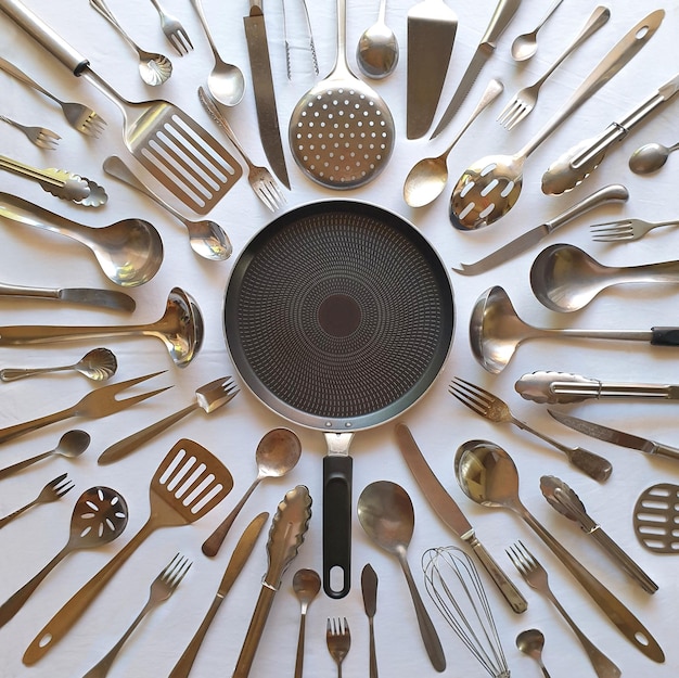 Photo directly above shot of kitchen utensils arranged on table