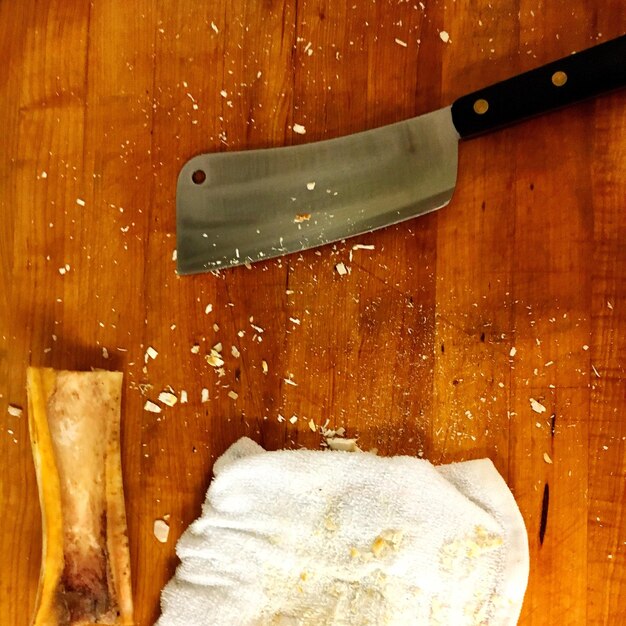 Photo directly above shot of knife and napkin on table