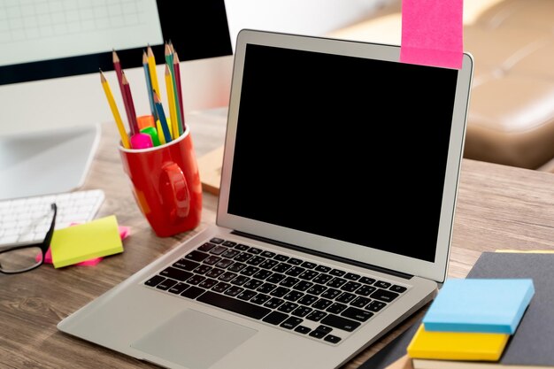 Photo directly above shot of laptop in glass on table