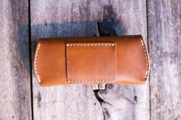 Photo directly above shot of leather on table against wall