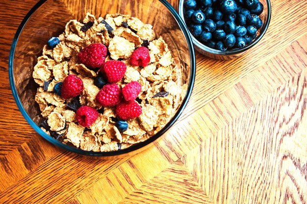 Photo directly above shot of muesli and blueberries on table