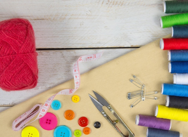 Directly above shot of multi colored sewing items on table