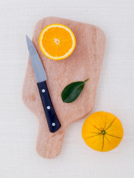 Directly above shot of orange on cutting board