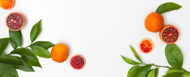 Photo directly above shot of orange fruits against white background