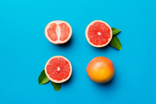 Directly above shot of oranges on blue background