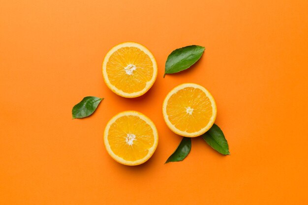 Directly above shot of oranges on yellow background