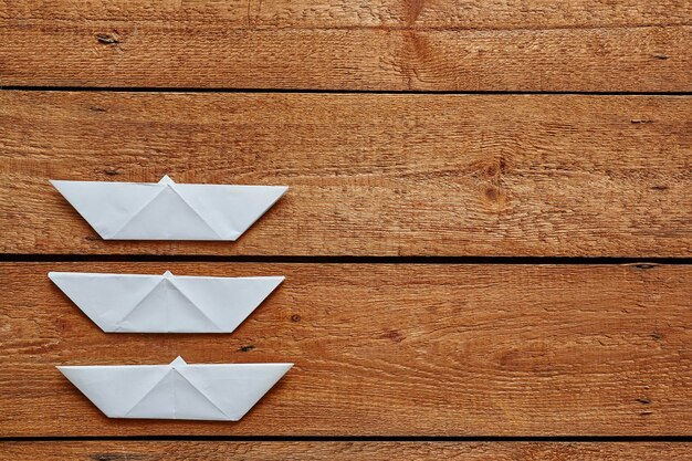 Photo directly above shot of paper boats on table