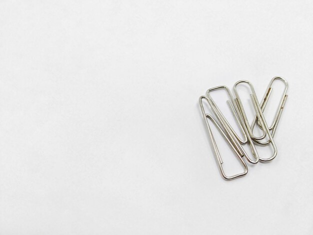 Photo directly above shot of paper clips on gray background