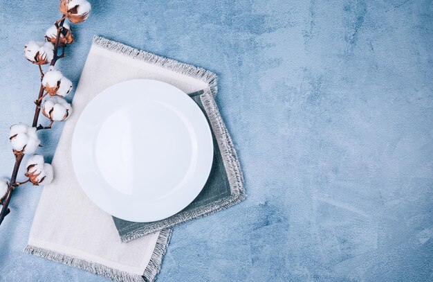 Directly above shot of person holding book on table