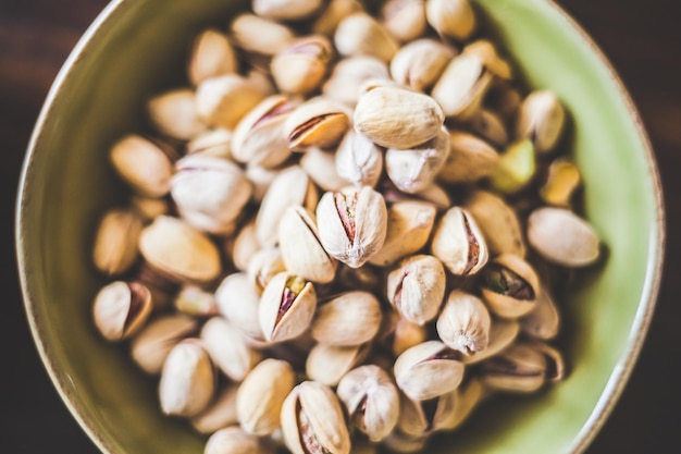 Photo directly above shot of pistachios in bowl