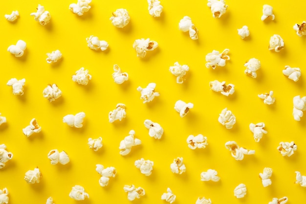 Photo directly above shot of popcorn on yellow background