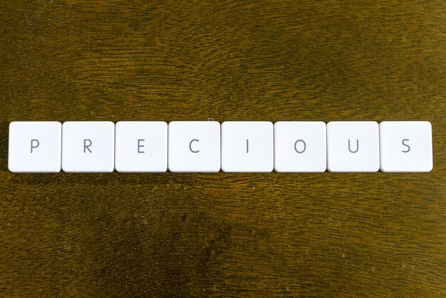directly above shot of precious text on table