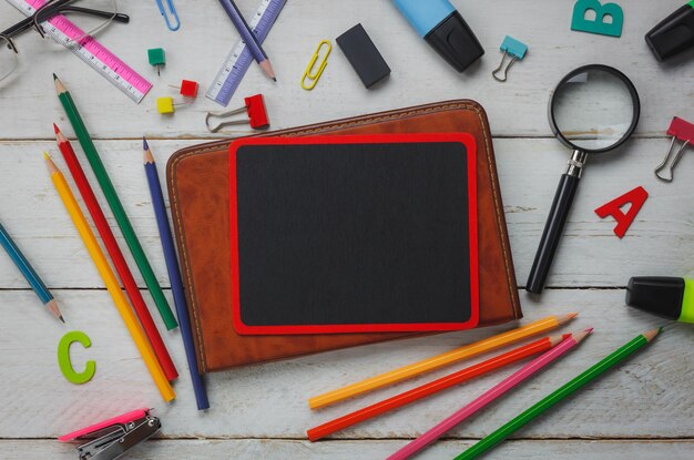 directly above shot of school supplies on table