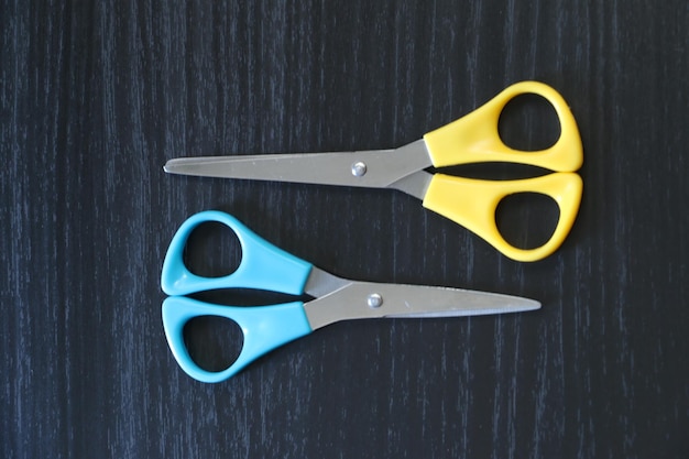 Photo directly above shot of scissors on table