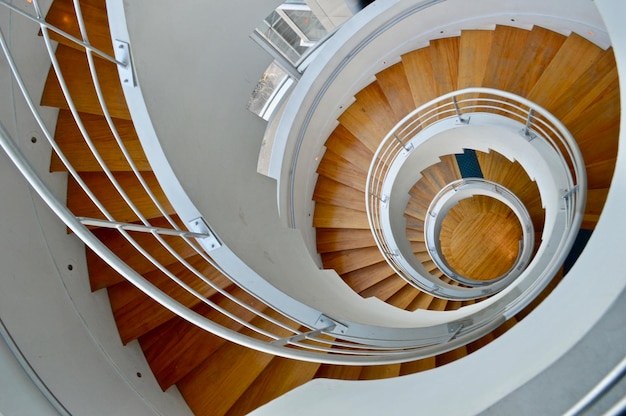 Directly below shot of spiral staircase in building