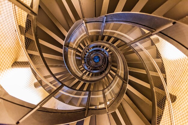 Photo directly below shot of spiral staircase in building