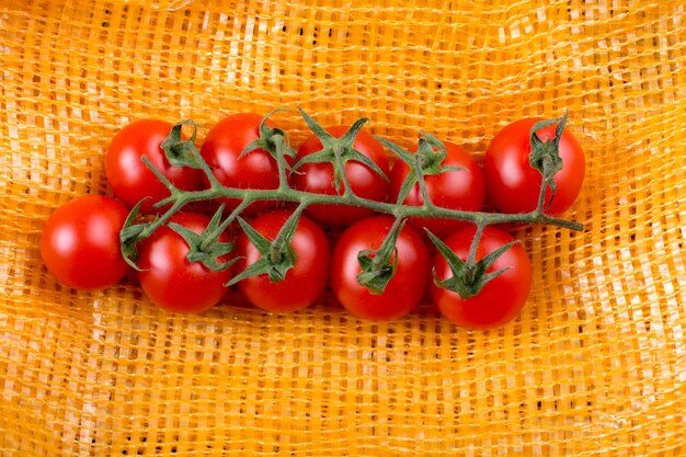 Directly above shot of tomatoes in basket on table