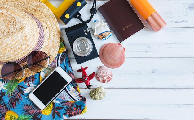 Photo directly above shot of travel equipment on wooden table