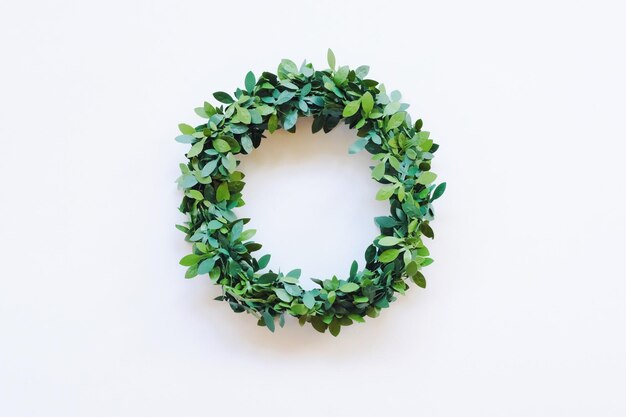 Directly above shot of wreath against white background