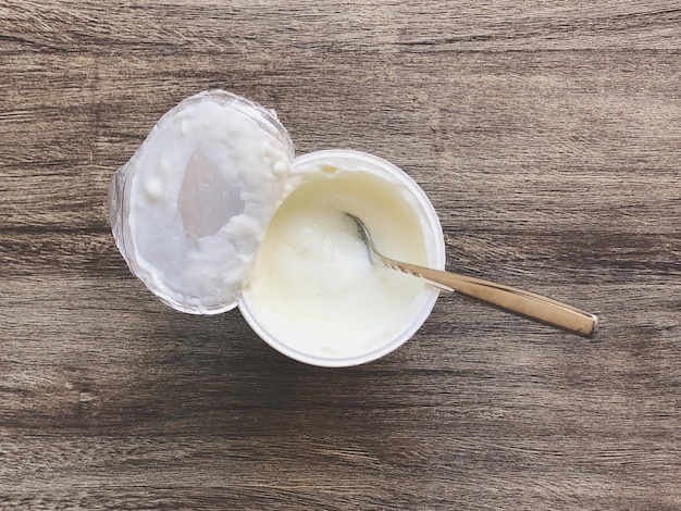 Photo directly above shot of yogurt in container on table