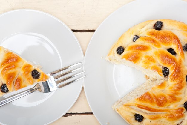 Directly above view of fresh bread in plates on table